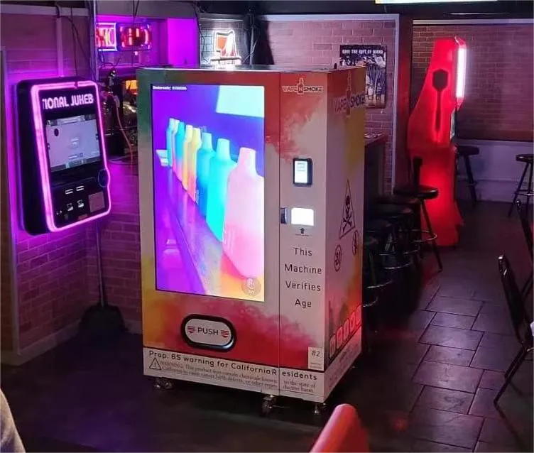 Micron E-cigarette vending machine with big touch screen, and it can hold 800~1000 vapes, 55 inch touch screen can upload advertisements and pictures E-cigarette vending machine, big touch screen vending machine, sell vape ecigarette vending machine in the USA