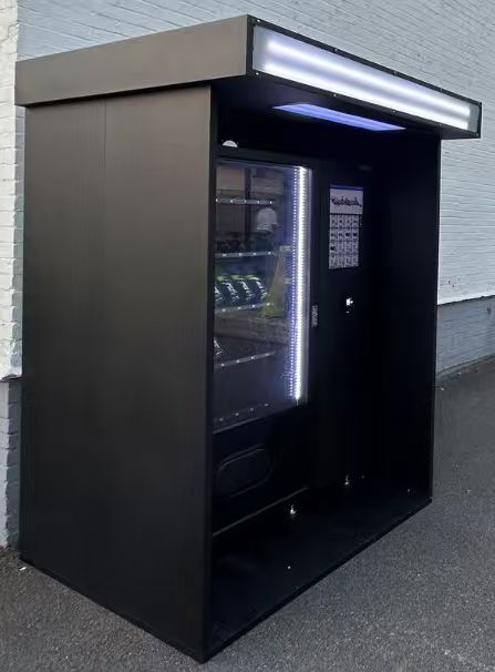 A client match his vending machine with our outdoor house, and place it in the open-air place