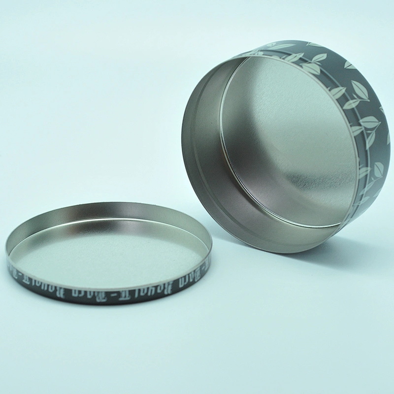 empty metal paint tea leaf tin can