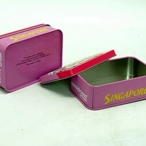 Small embossed tin can for sweet with cartoon design