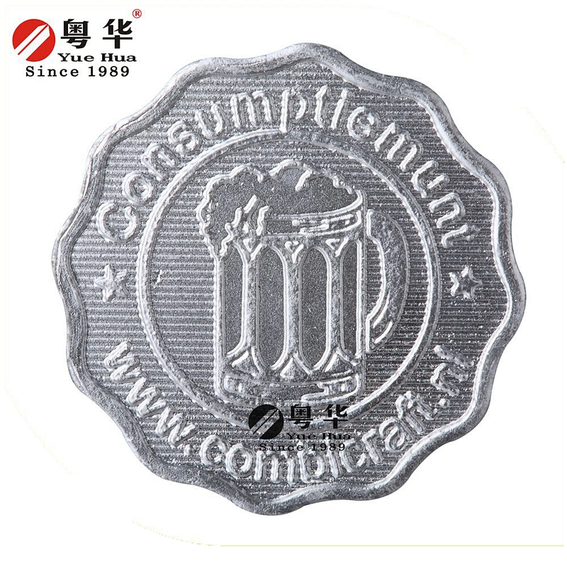 Half dollar sized Quincunx Token
