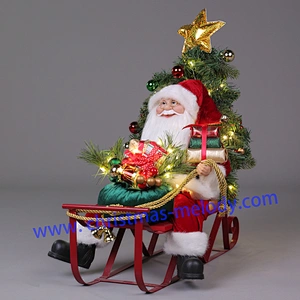 Wearing red and  riding a sleigh santa claus