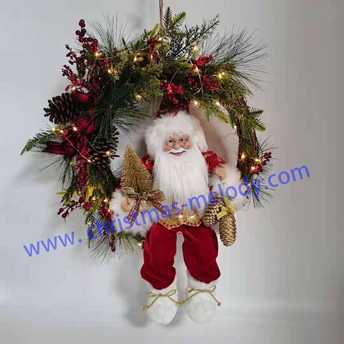 Santa sitting in a garland with lights