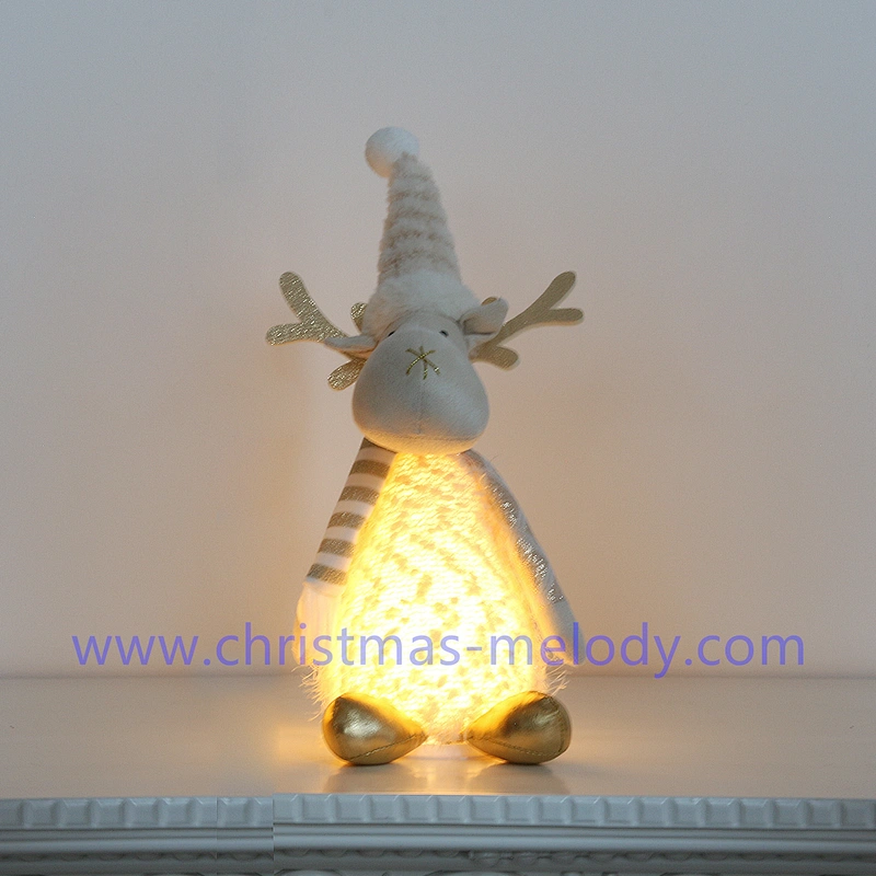 A pair of deer with Christmas lights
