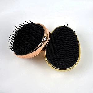 Skillful manufacture beautiful design color brilliancy electroplated surface mini egg shape detangle hairbrush