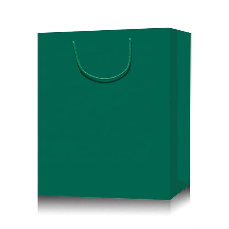 Stock Colorful small size paper bags with Xmax designs suitable for packing gifts or foods