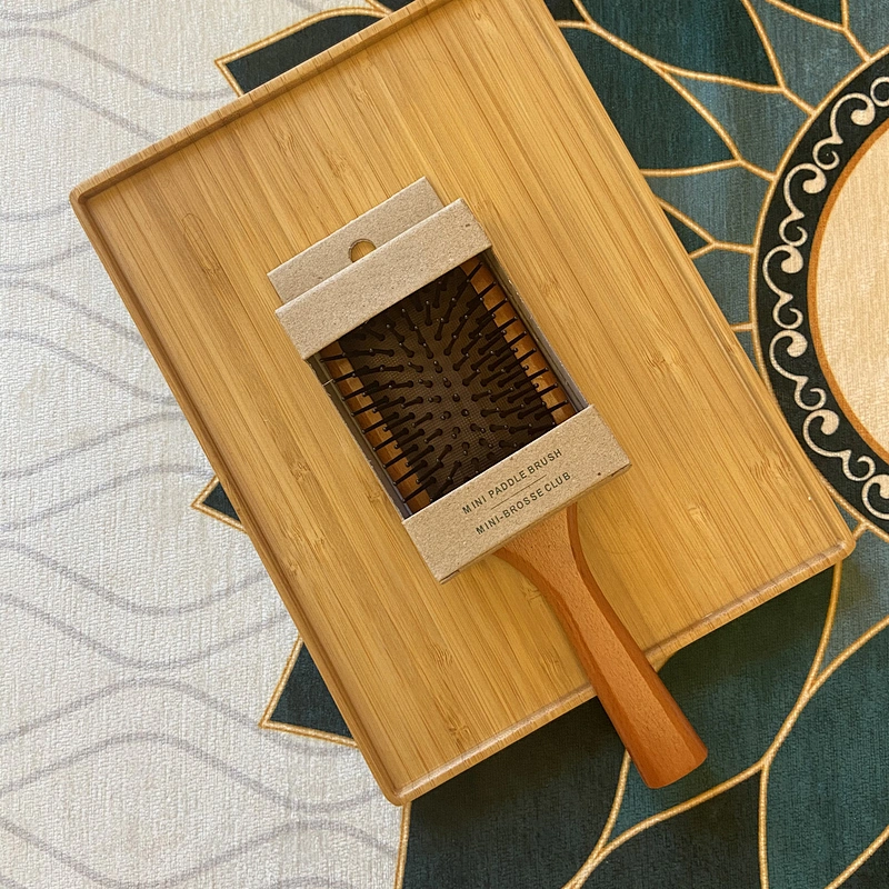 wooden paddle brush