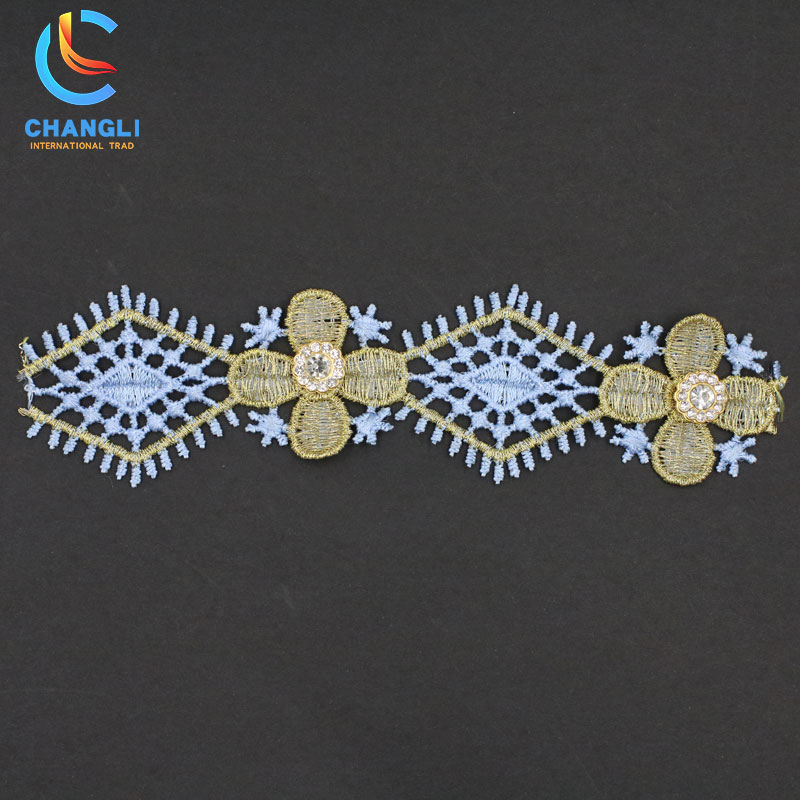 Snowflake and leaf hand-embroidered lace