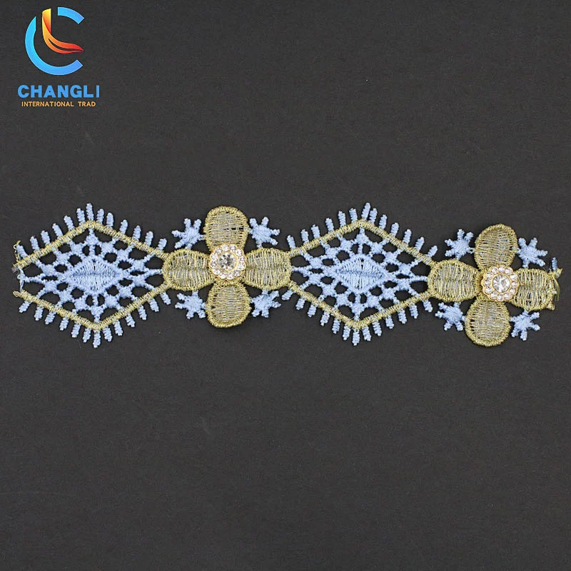 Snowflake and leaf hand-embroidered lace