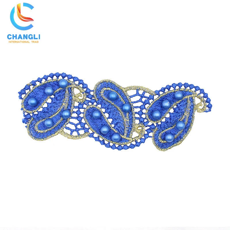 Blue hand-embroidered lace with thread ball