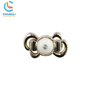 Shoe button (74)