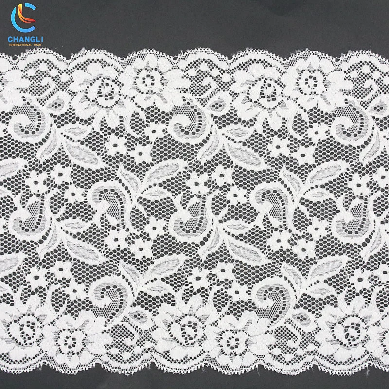 Transparent lace with small flowers and grass