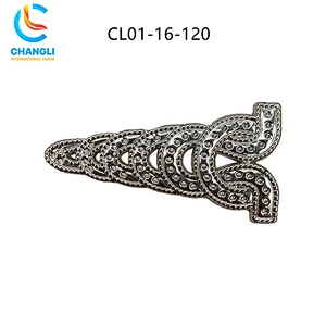 Shoe button (102)
