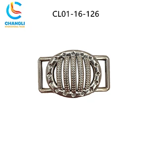Shoe button (108)