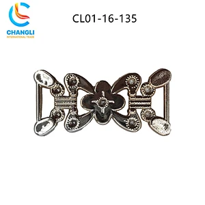Shoe button (117)