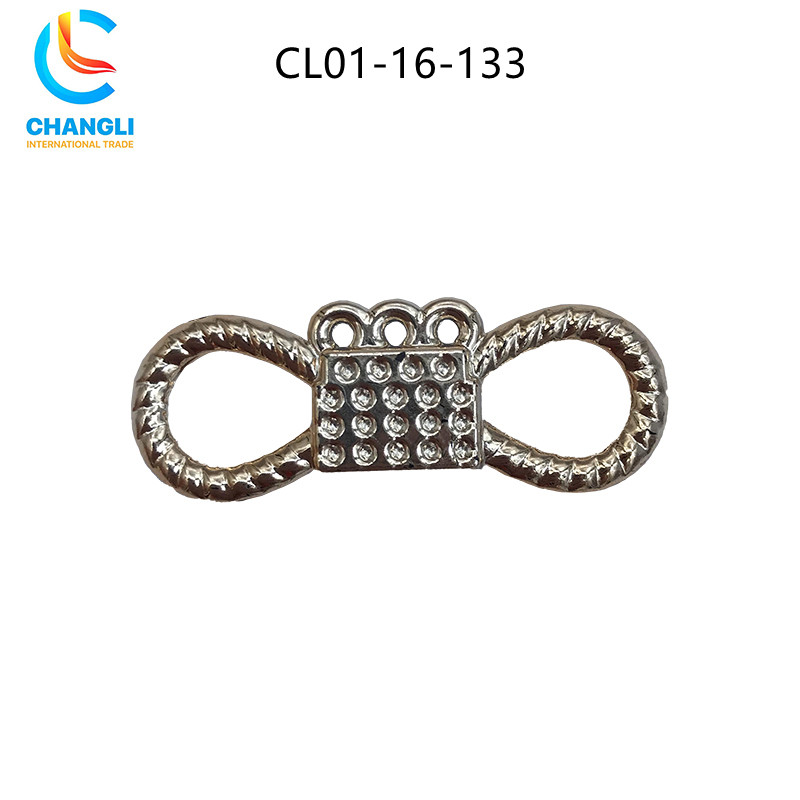 Shoe button (115)