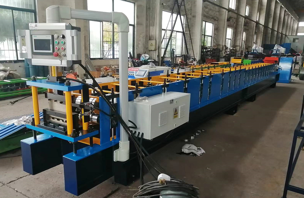Wall cladding panel roll forming machine