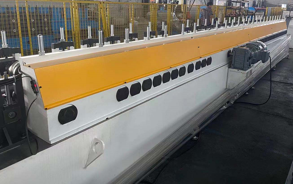 Metal tube making machine