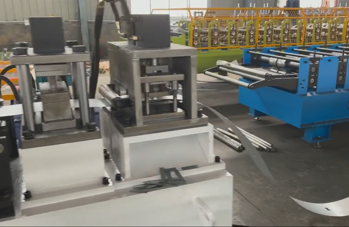 Metal tube making machine