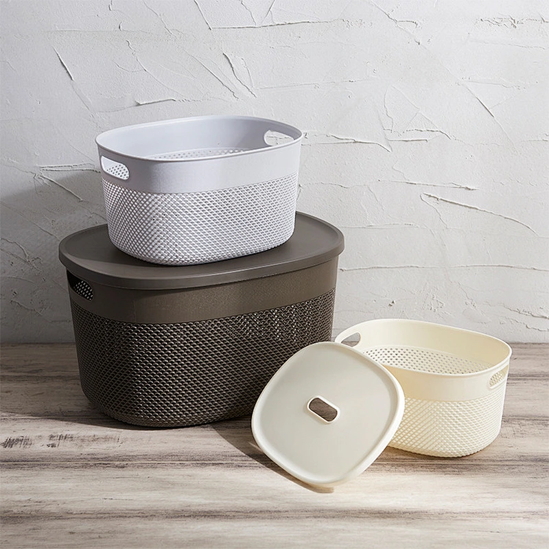 Plastic storage basket with lid