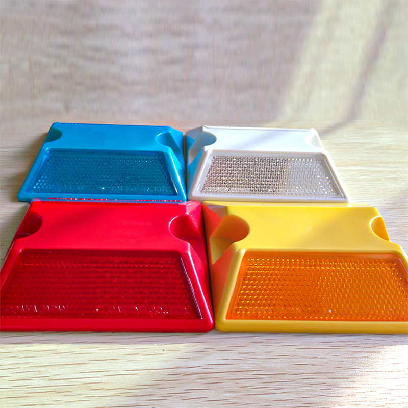Plastic raised cat eye reflective road marker