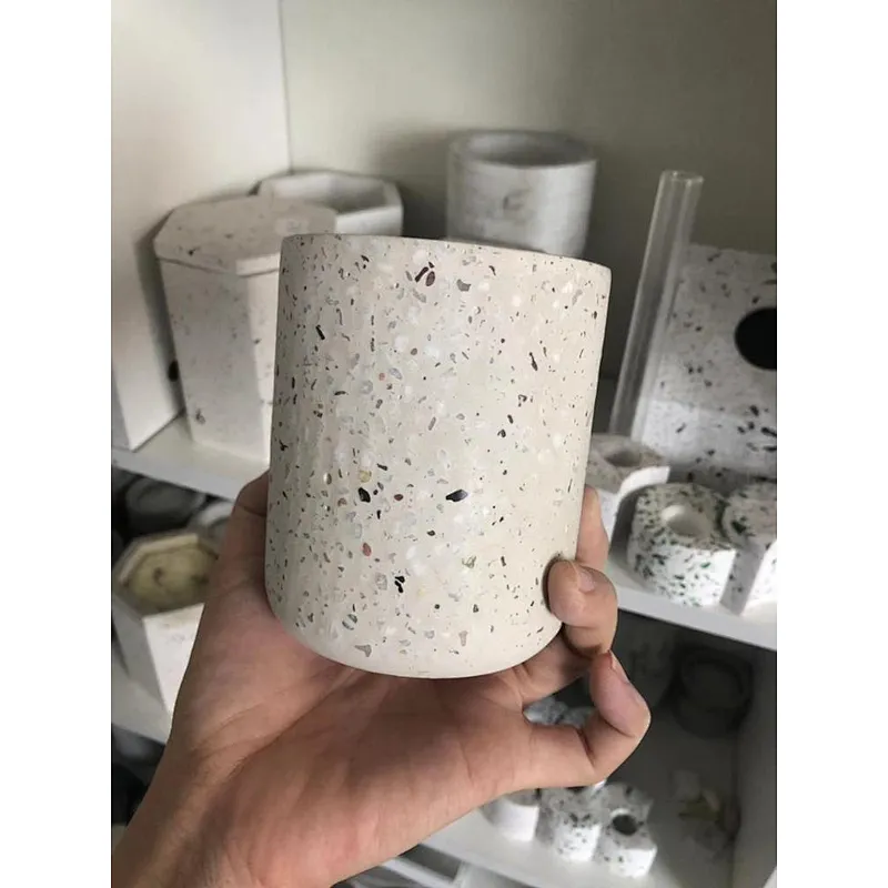 Handmade white terrazzo with colorful aggregates used for candle jar and candle holder