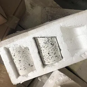 Handmade white terrazzo with colorful aggregates used for candle jar and candle holder