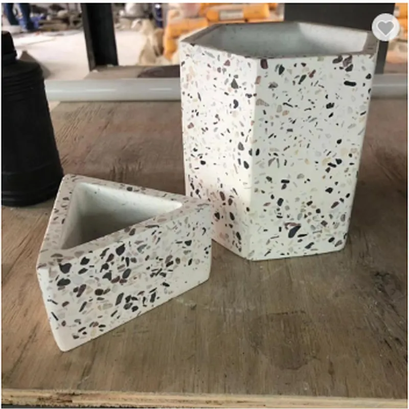 Handmade white terrazzo with colorful aggregates used for candle jar and candle holder