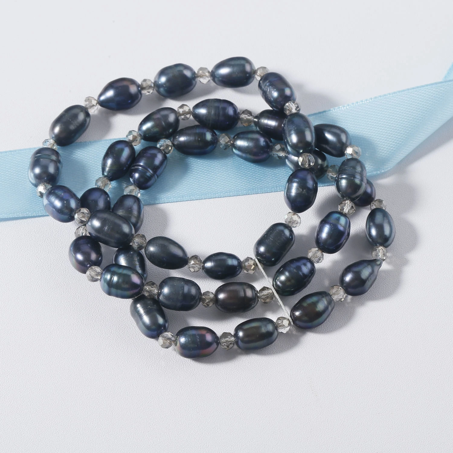 Three rows 8-9mm rice freshwater pearl bracelet with gemstone