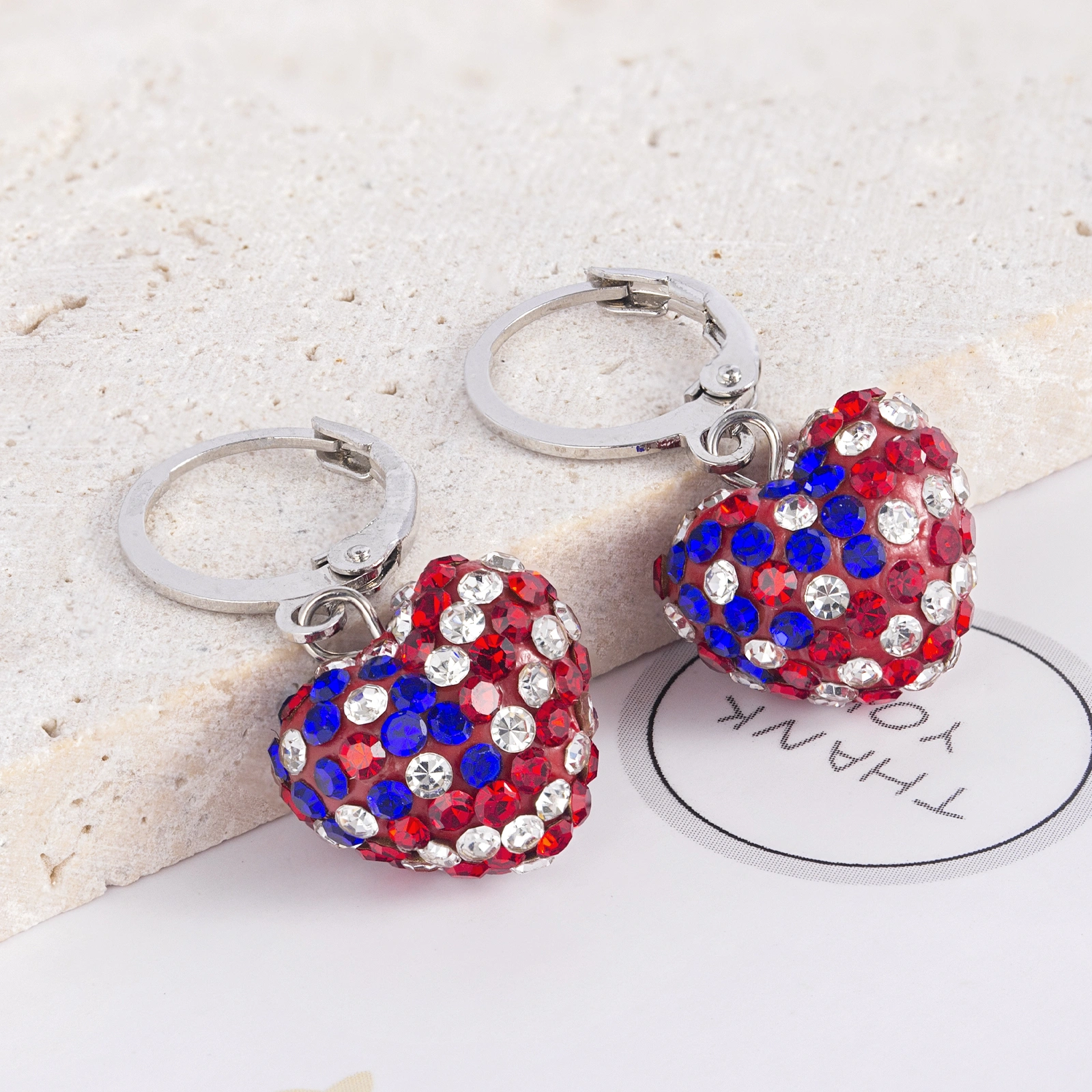 brass leverback earrings with colorful heart shape crystal drop
