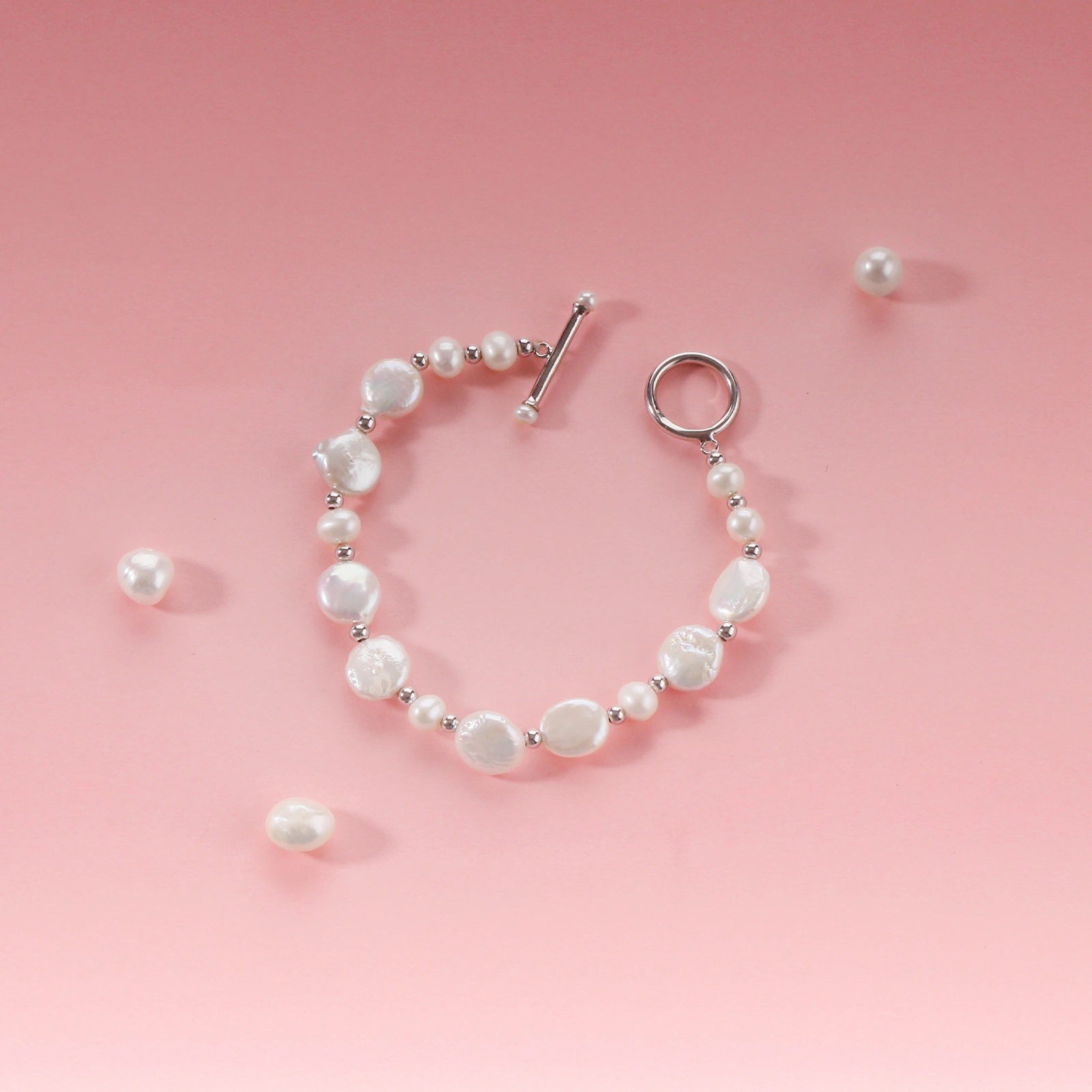 10-12mm freshwater coin pearl + 6-7mm round pearl + 3mm sterling silver beads