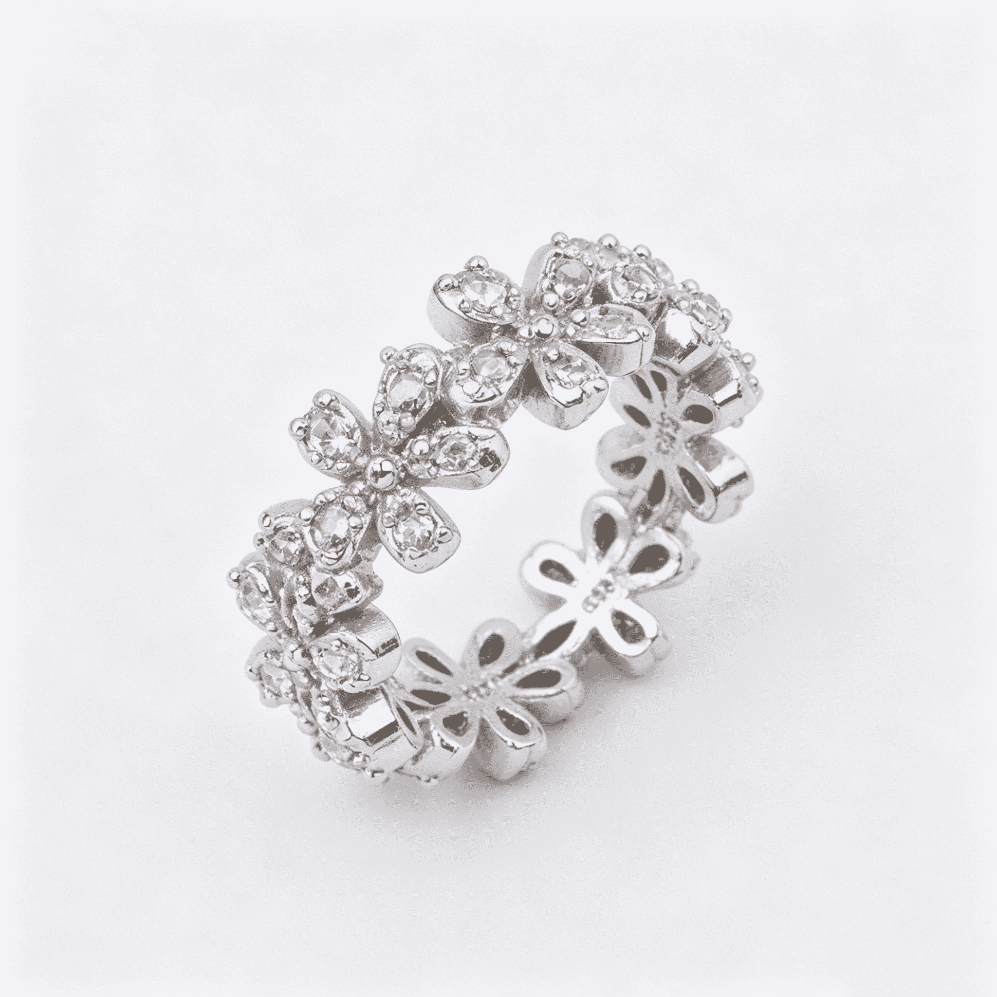 Each flower fully set with round clear cubic zirconia stones with multi-faceted cuts, sparkling brightly under all light sources