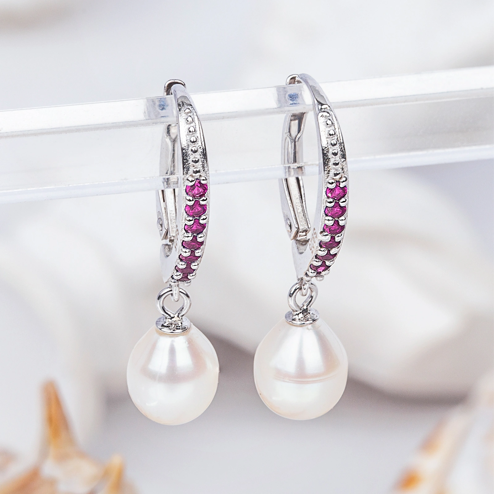 6x8mm white rice shape freshwater cultured pearl silver leverback earrings paved with red cz for women