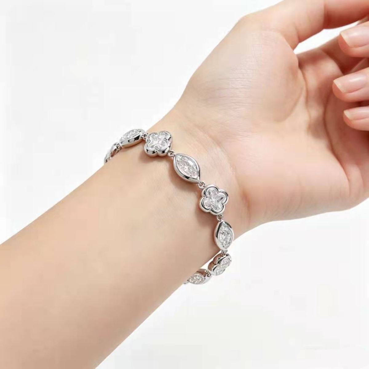 A contemporary twist on classic chain jewelry, this bracelet features bold geometric paperclip links fully encrusted with bright white cubic zirconia.