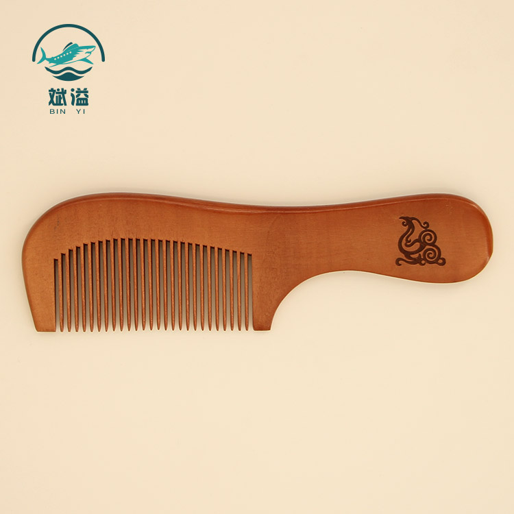 Wooden comb with handle