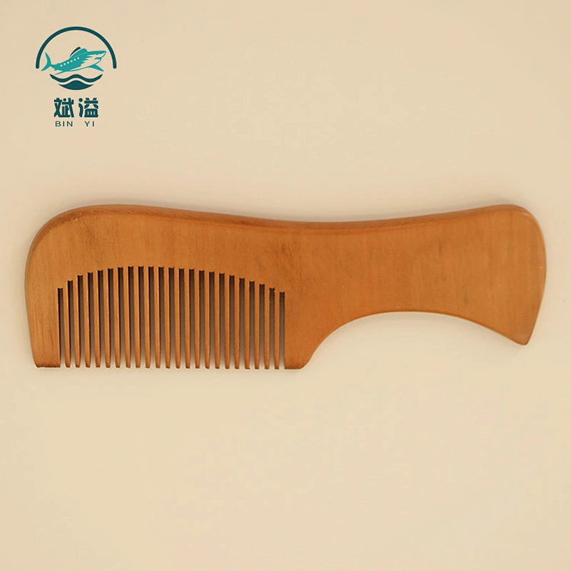 Wooden comb with handle
