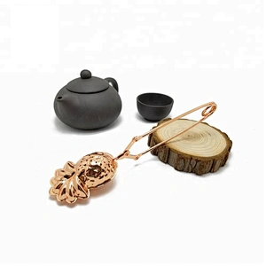 High quality stainless steel rose gold plating pineapple shape tea infuser with clamp handle