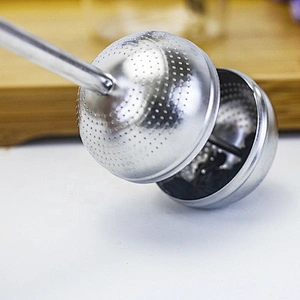 304 stainless steel ellipse ball shape tea infuser tea strainer with pushing handle