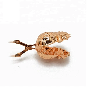 High quality stainless steel rose gold plating pineapple shape tea infuser with clamp handle