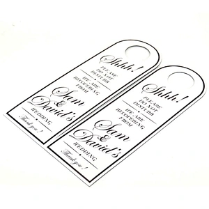 Custom China Luxury Glossy Lamination Recycled Paper Hang Tag With  Spot UV Logo For Clothing Label