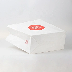 Cheap price custom kraft paper gift bag with handle