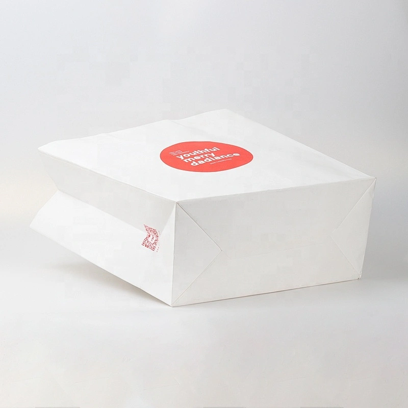Cheap price custom kraft paper gift bag with handle