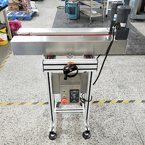 Conveyor belt for ink jet printer, Bottle Clamping Conveyor