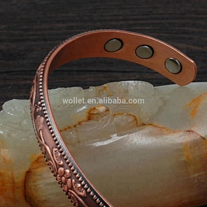Hot sales wholesale pretty energy magnetic bright yellow copper bracelet with flower pattern