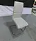 white faux leather chair