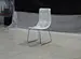 white faux leather chair