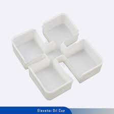 Elevator oil cup