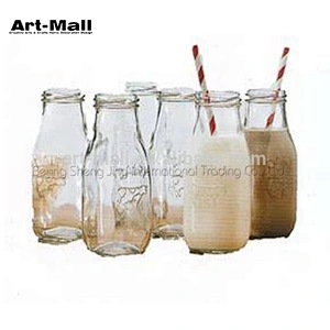 Factory unique design swing top empty glass milk water bottle