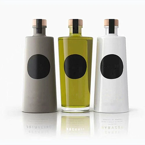 La botella de cristal de alta calidad al por mayor única modifica las botellas de cristal del whisky para requisitos particulares con la tapa para la bebida