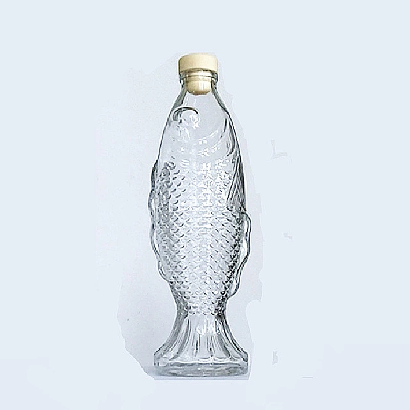 500ml16oz Wholesale New Design fish Unique Style Animal glass bottles Custom water bottle with airtight lid for beverage liquor